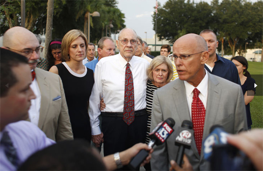 Attorneys at Firm addressing Press